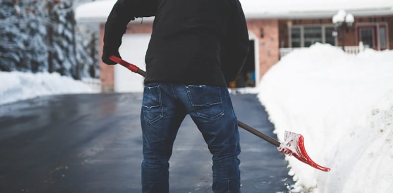 How to Ease Back Pain Caused by Shovelling Snow